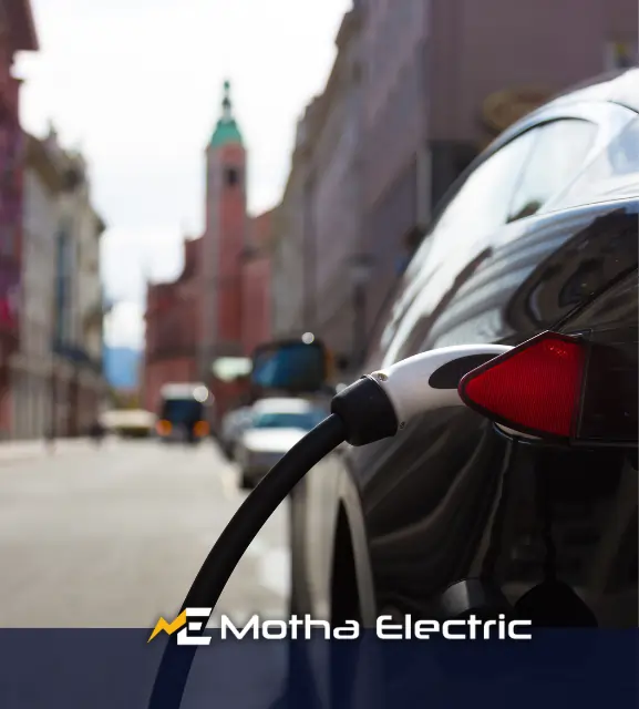 Electric vehicle charging with an EV charger installed by Motha Electric in Middlesex County, MA.